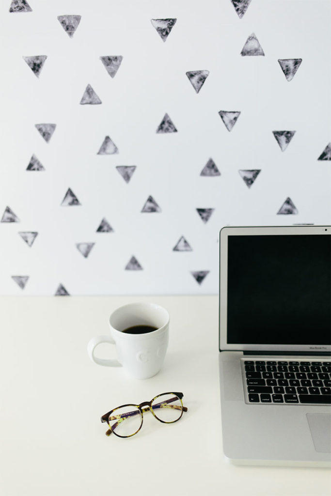 Laptop with coffee and glasses